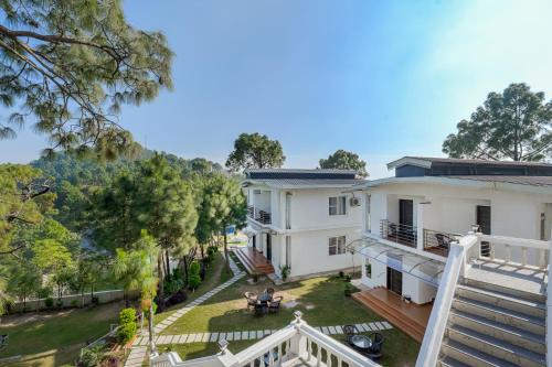 Nahan Hotel | ELIVAAS Stars and Windsongs with Shared Pool, Garden, Game Zone, Restaurant, & Hill Views Pet-friendly