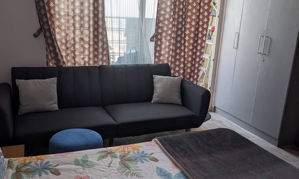 Greater Noida Apartment | Indo-Anglo with big bench