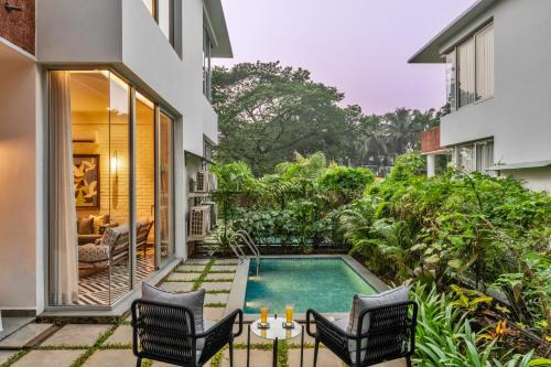 Kudal Villa | La Masillia by The Blue Kite - 2 BHK with Private Pool, 15 mins from Morjim Beach, Wifi, Peaceful location, Kitchen, Security, Patio