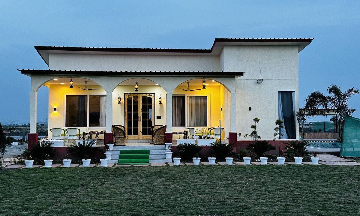 Noida House | M H Farm A premium Farmhouse 3BHK villa with Pool river view