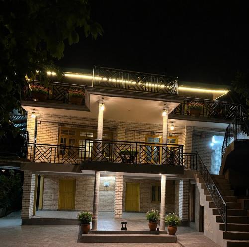 Kullu House | Mandala House & Café with Mud House Retreat