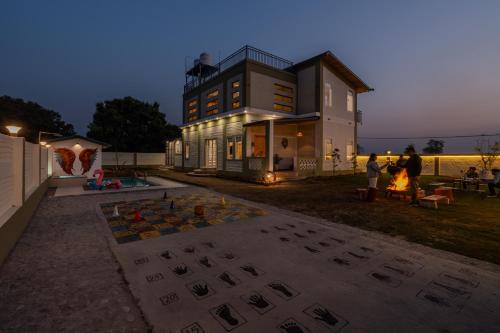 Bail Parao Villa | SaffronStays Sher Bagh - 4BR eco-friendly pool villa with jungle trails, farm-to-table meals & bonfire nights near Corbett Park