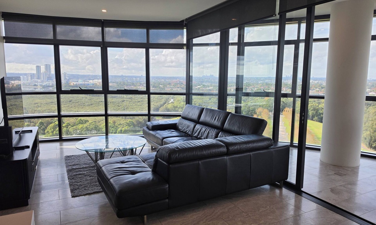 Sydney Olympic Park Apartment | Sky-High 3BR Oasis: City/Park View & Two Secure Parking Spots
