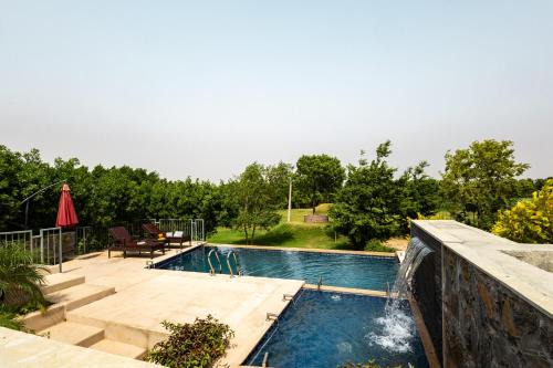 Rajawas Villa | Stone Age home 4-BHK Stone-Clad Villa with Private Pool, Terrace Garden & Gazebo
