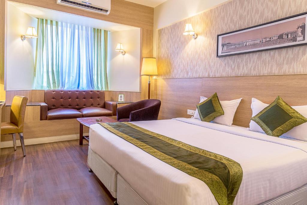 Pimpri - Chinchwad Hotel | Treebo Premium Grand Emerald