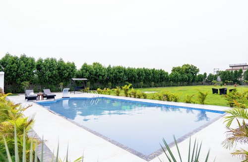 Faridabad Villa | Alaya Stays Malik Farms Wooden Cottages