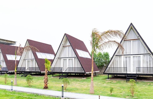 Faridabad Villa | Alaya Stays Malik Farms Wooden Cottages