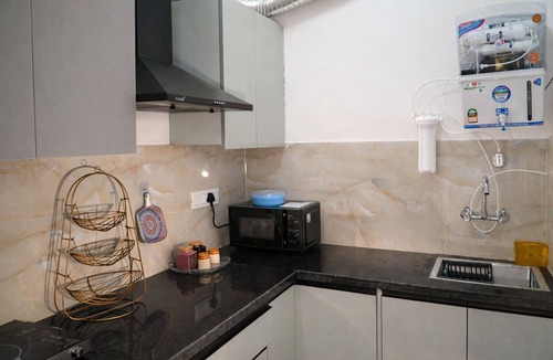 DLF Phase 5 Apartment | Amlatas Home, 1-bedroom apartment with AC in pleasant Gurugram location