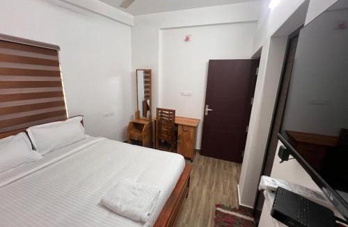 Guruvayur Cabin | Ashtapadi Inn