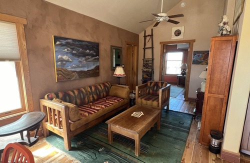 Abiquiu House | Awe inspiring views overlooking the Chama river valley, iconic Pedernal. Cozy.