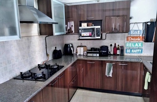 Noida Apartment | Beautiful Serviced apartment with garden and pool view