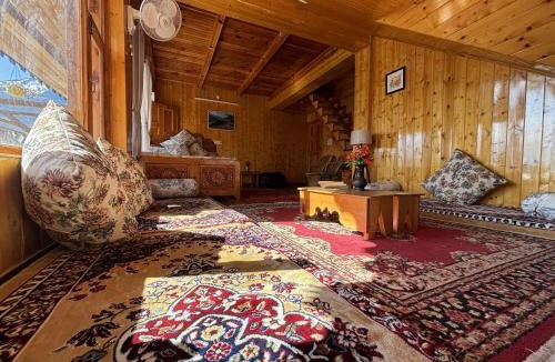 Naggar Hotel | Cafe Saffron Sips & Stays - Alpine Suites Naggar Near Manali