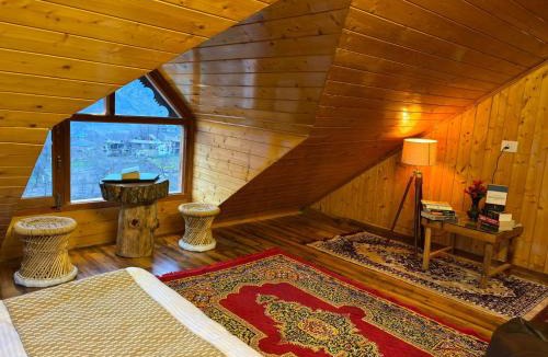 Naggar Hotel | Cafe Saffron Sips & Stays - Alpine Suites Naggar Near Manali