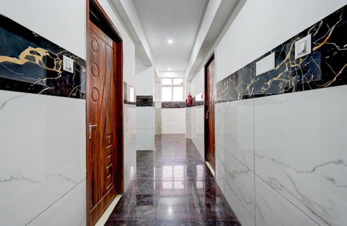 Chennai Hotel | Collection O Karumariamman Temple Thiruverkadu Formerly Sridevi Residency