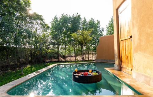 Sonepat Resort | ELIVAAS Signature Aanandam Villas and Resort Pet-friendly Premium Room With Shared Pool, Restaurant & Garden