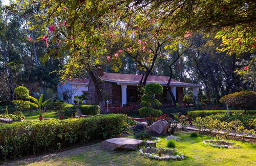 Faridabad Villa | ELIVAAS Signature The Aravalli Reserve The Lotus Pet-friendly Villa with Pvt Pool, Jacuzzi and Pond