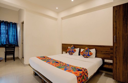 Narasapura Hotel | FabHotel Purple Grand - Jalahalli West