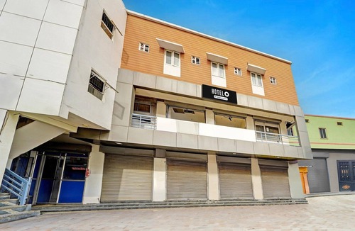 Dindigul House | Hotel O Dindugal Bus Terminal GK Building