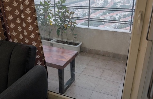 Greater Noida Apartment | Indo-Anglo with big bench
