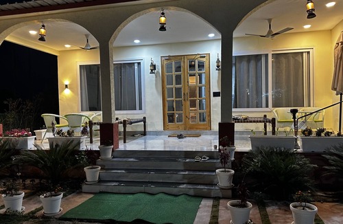 Noida House | M H Farm A premium Farmhouse 3BHK villa with Pool river view