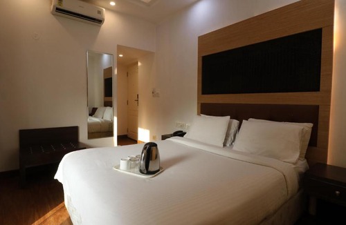 Electronics City Hotel | Omatra V Suites Electronic City
