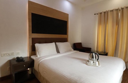 Electronics City Hotel | Omatra V Suites Electronic City