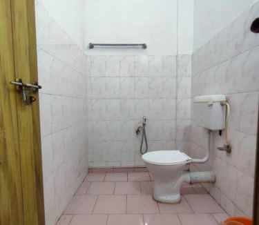 Thrissur Hotel | Omega Tourist Home