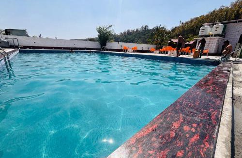 Bullawala Hotel | Petals Cafe & Resort