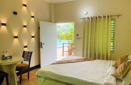 Dhaka Division Hotel | Purbachal Nijhum Polli Resort