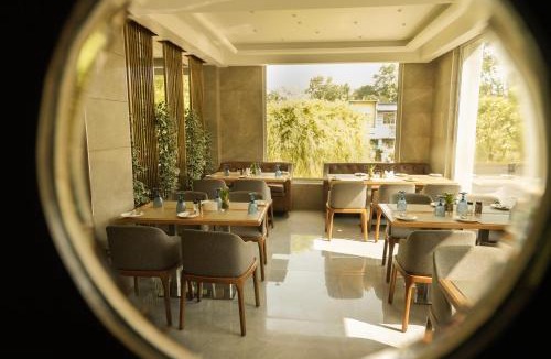 Kanjirappally Hotel | Raj Regent Manarcadu