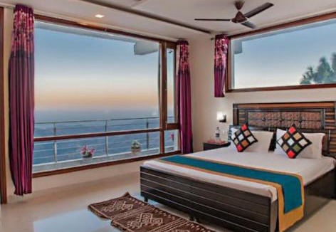 Kuthar Apartment | Red and Blue Apartments by grotto peace