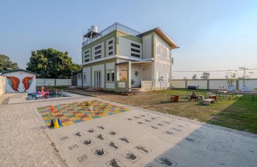 Bail Parao Villa | SaffronStays Sher Bagh - 4BR eco-friendly pool villa with jungle trails, farm-to-table meals & bonfire nights near Corbett Park