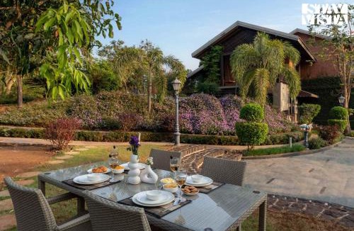 Nashik Villa | StayVista at Brickhouse Aranya with Pool and Farm View