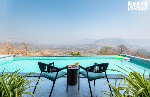 Paud Villa | StayVista at Evara Farms with Pool, Lawn & Mountain View
