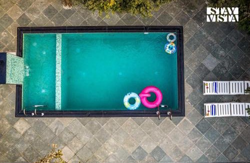 Bedla Villa | StayVista at Madhuram Villa - BBQ & Pool