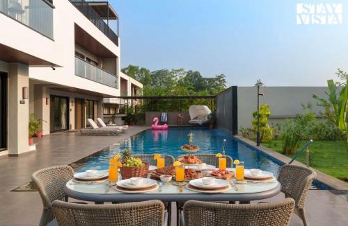 Karjat Villa | StayVista at The Amaryllis with Heated Pool & Projector Set-Up