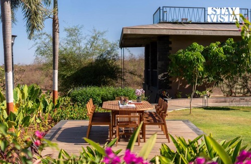 Nashik Villa | StayVista at The Earth Stone with Infinity Pool, Lawn