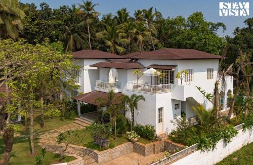Sangolda Villa | StayVista at Villa Selene - Dolly J Homes with Pool