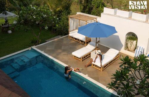 Sangolda Villa | StayVista at Villa Selene - Dolly J Homes with Pool