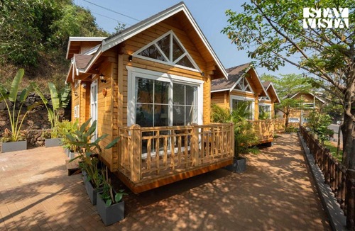 Morjim Villa | StayVista at Woodhouse Story with Pool, WiFi, AC