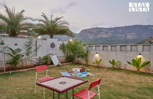 Lonavala Villa | StayVista's Kaarma Villa - Valley-View Villa with Outdoor Pool, Lawn featuring a Gazebo & Machan