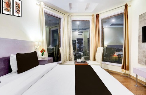 Thanesar Hotel | Super Townhouse by OYO Brahma Sarovar Formerly Krishna mahal