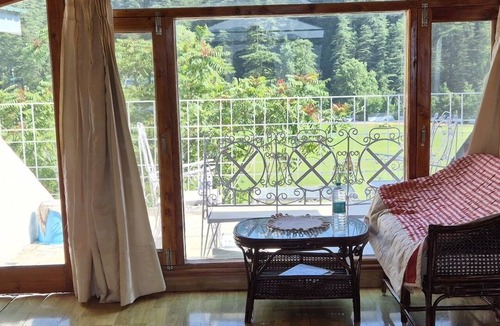 Shimla Apartment | The Front Seat — A golf view attic