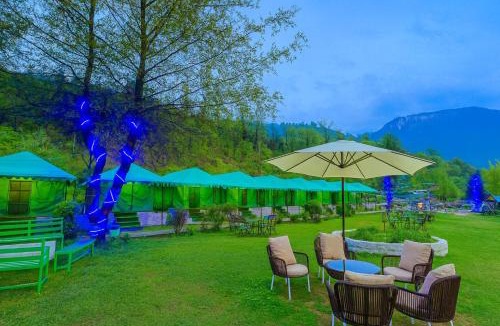 Gadherni Hotel | The Himalayan Swiss Cottage with Bonfire, Manali - A Riverside Retreat