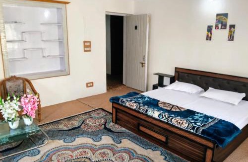 Rajbagh Ski Chalet | The Holt Gardens