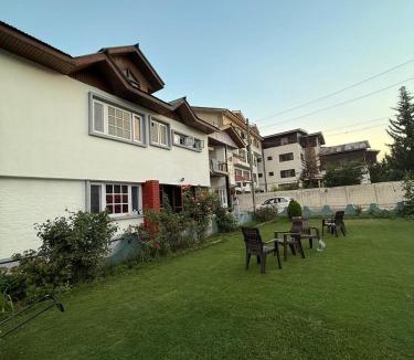 Rajbagh Ski Chalet | The Holt Gardens