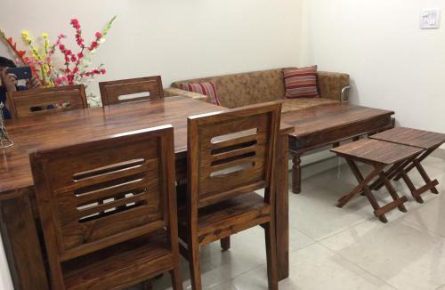 Sainik Farm House | The Raveesh E24 - 2BHK Serviced Apartment