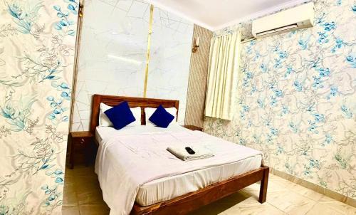 Sainik Farm House | The Raveesh E24 - 2BHK Serviced Apartment