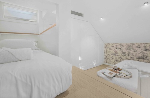 Newtown House | Urban oasis: Stylish 4BR retreat in vibrant Newtown