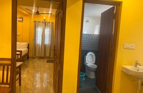 Kalapettai Hotel | White Yellow Residency